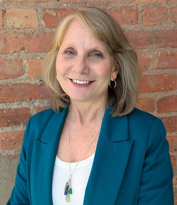 Headshot photo of Karol Kennedy, retiring Director of Bridges Library System.